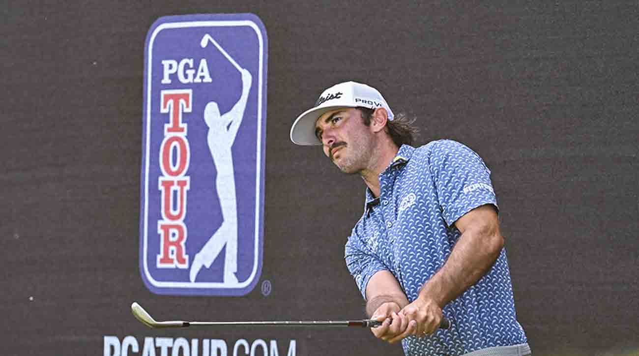Max Homa chips a shot next to PGA Tour signage during the 2022 Arnold Palmer Invitational presented by MasterCard at Bay Hill Club and Lodge in Orlando, Fla.